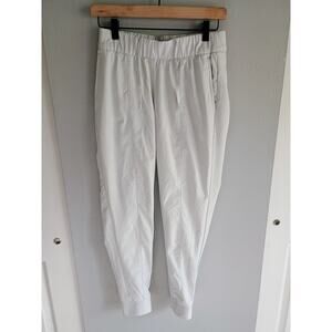 Nike track pants joggers in Ivory white pockets xs athleisure gym sports running